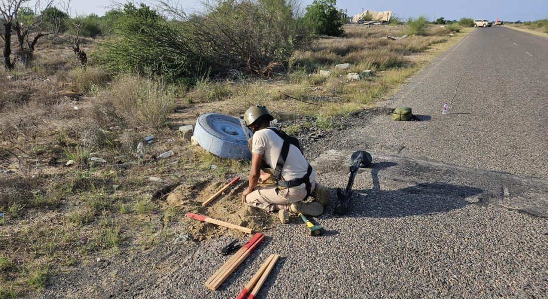 IED Next to road resembling truck tire